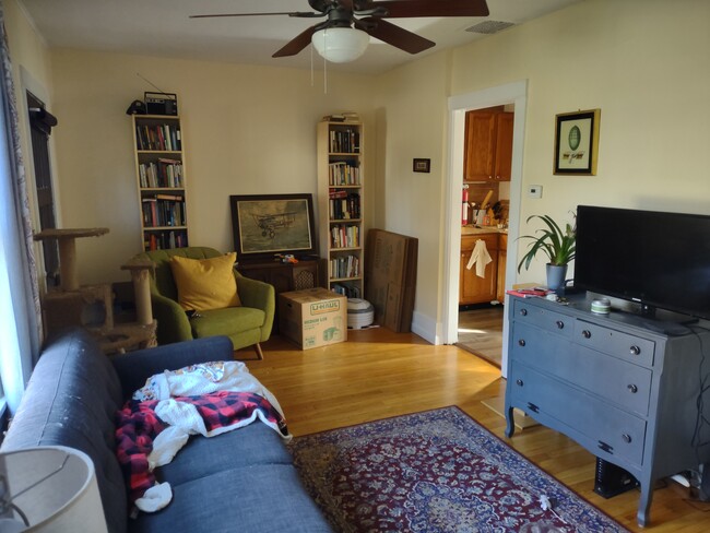 View of living room when entering from side entrance. - 803 Pearl St