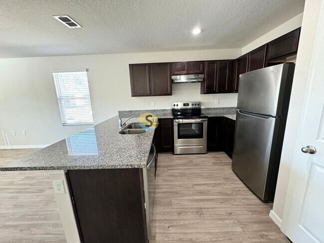 Foto del edificio - 6522 Sweetbay Ln