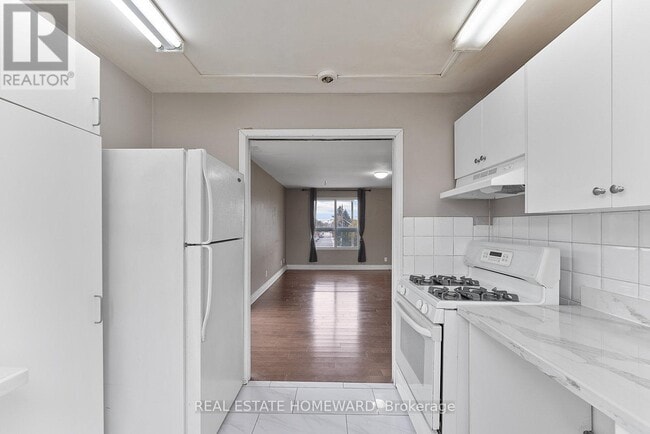 Building Photo - 983 Victoria Park Ave