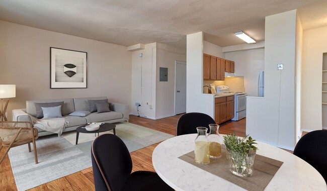 Spacious living room with wood flooring - Chestnut Hall