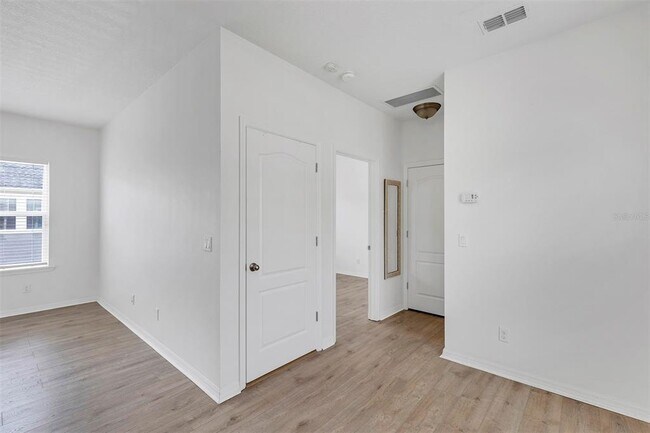 Building Photo - 8558 Tavistock Lakes Blvd