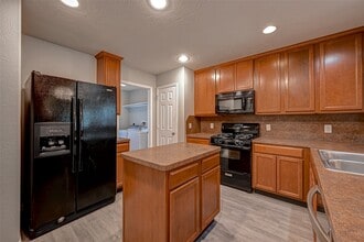 Building Photo - 8210 Rustic Cape Dr