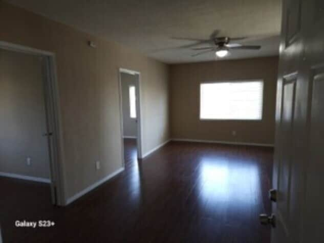 Apartment 240 Living Room (view front front door) - 240 E 6th St