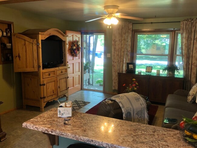 Living room with front door - 414 N Adair St