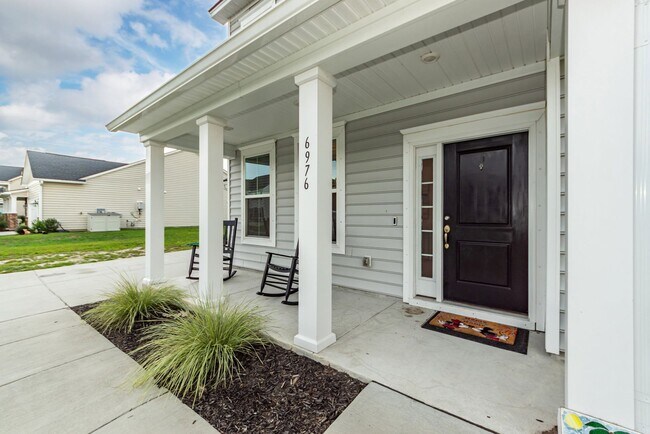 Building Photo - 6976 Pumpkinseed Dr