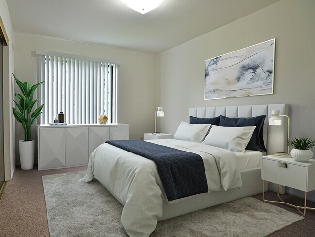 Un amplio dormitorio en Charter Oak Apartments, Davison, Michigan. - Charter Oaks Apartments