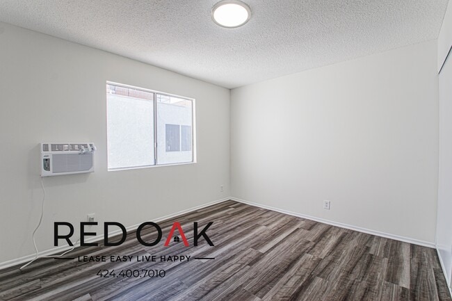 Building Photo - 619 N Kingsley Dr