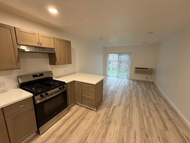 Building Photo - Newly Remodeled | All Utilities Included | AC + Heat | Move-In Ready