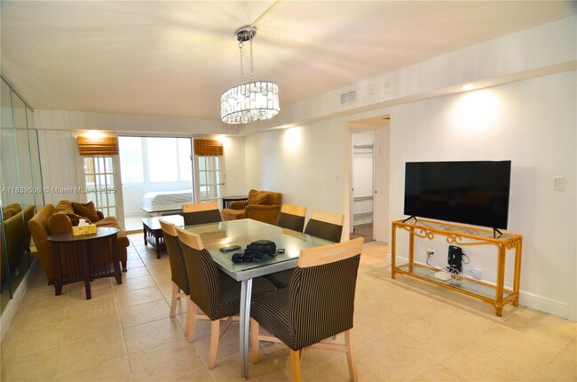 Building Photo - 5005 Collins Ave
