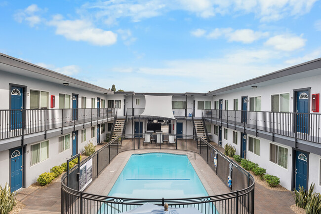 Enjoy a dip in our of our sparkling blue pools - Four Seasons Apartments