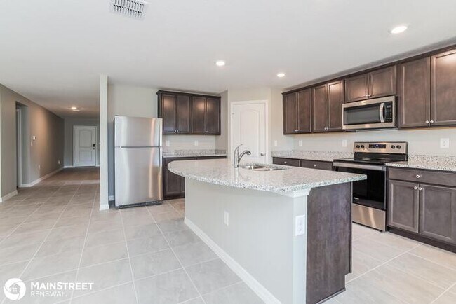 Building Photo - 1670 Hideaway Flat St, Mascotte, FL 34753