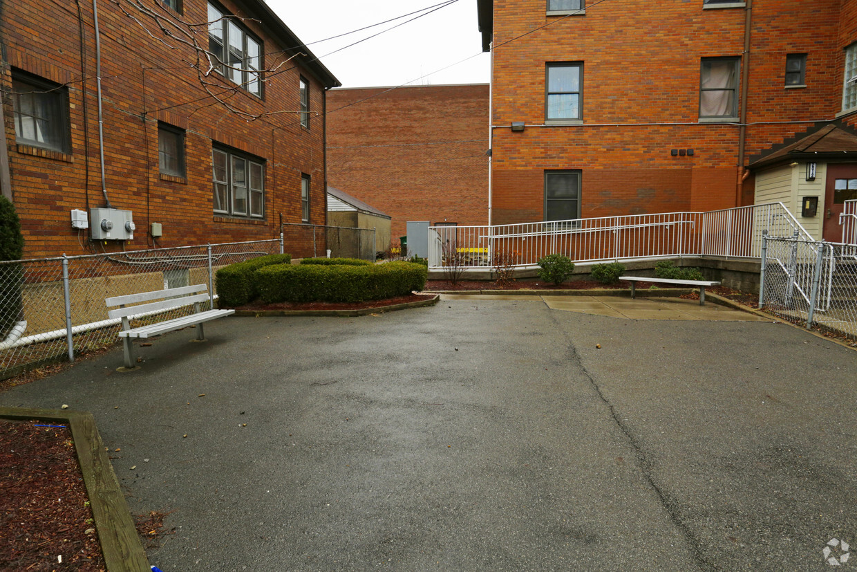 Building Photo - John F. Kennedy Apartments