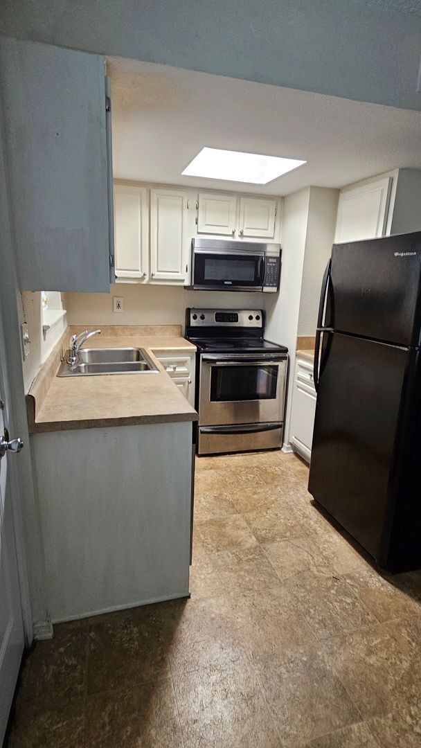 Foto del edificio - 1 bed 1 bath townhome in the Heart of Spring Hill