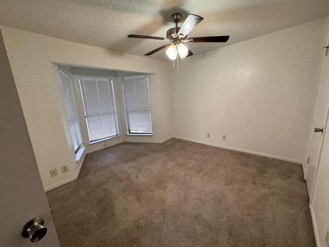 Bedroom has an alcove window and 2 closets - Cedar Station Apartments