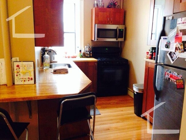 Building Photo - Nicely Renovated Unit in Brighton. Steps from the T Stop, Heat, Hot Water Included