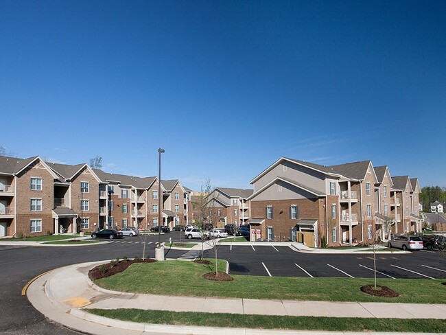 Brook Creek Crossings Apartments are pet friendly and have ample parking - Brook Creek Crossings