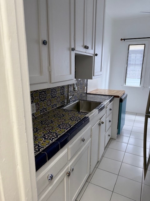 Origianl tile in kitchen - 232 N Clark Dr