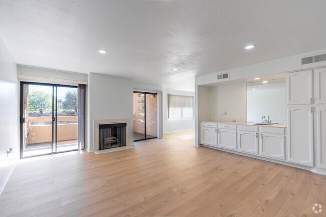 1BR, 2BA - 1,150SF - Living Room - Canyon Villas Place