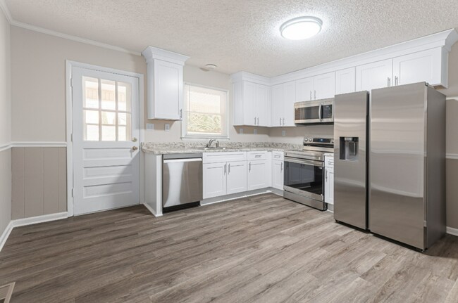 Foto del edificio - Adorable 2 BR duplex in the heart of Mboro!