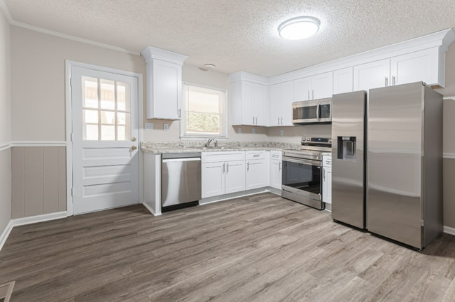 Photo - Adorable 2 BR duplex in the heart of Mboro! House