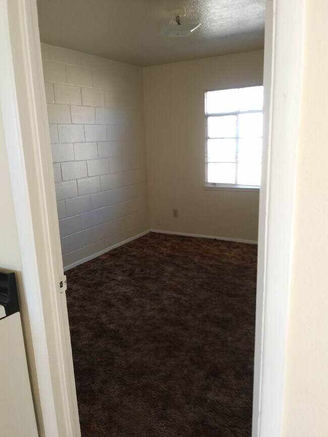 Building Photo - Two and three bedroom units with Washer ho...