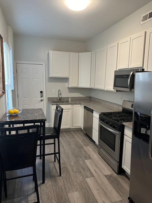 Primary Photo - Spacious Rooms! Newly Renovated! Fenced in...