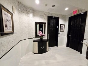 Building Photo - 18201 Collins Ave