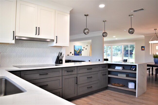 Custom floating shelves with Bluetooth LED strip lights in kitchen - 6325 Kellow Dr