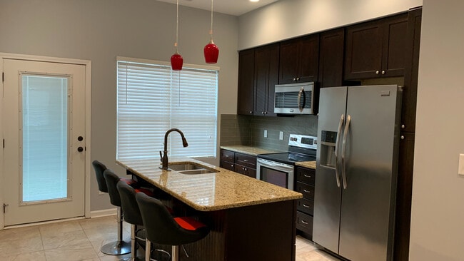 Building Photo - Room in Single Family Home on Pineland Cir