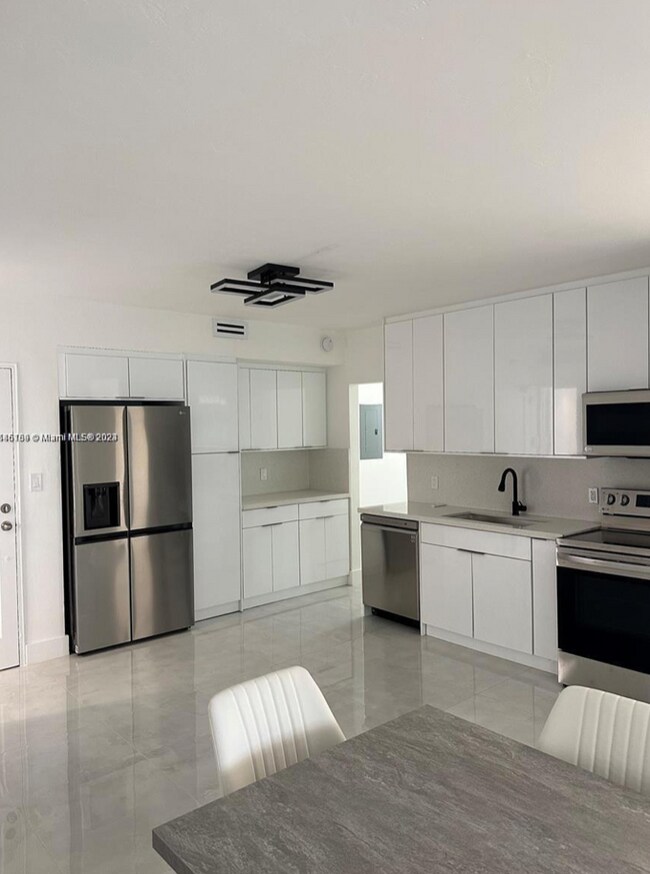 Building Photo - 10185 Collins Ave