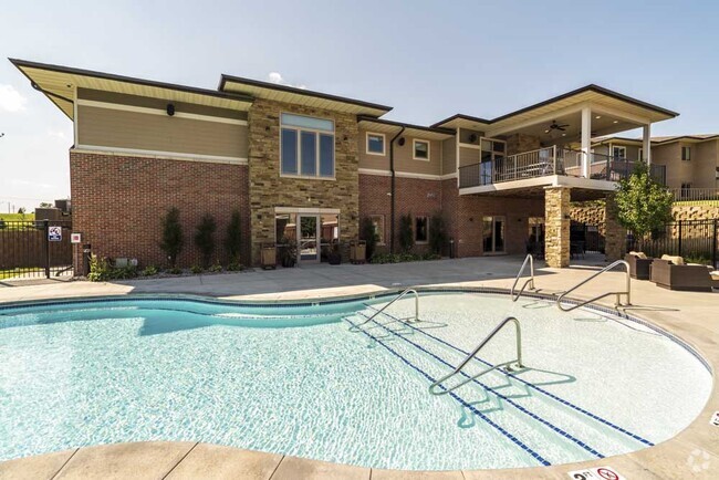 Hot days call for cool swims in our resort-style swimming pool. - Villas of Omaha at Butler Ridge