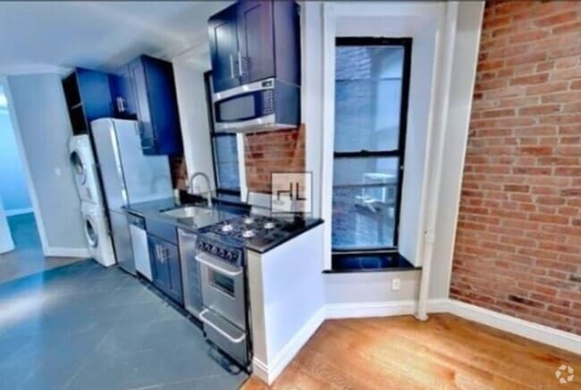 Building Photo - AFFORDABLE, SPACIOUS + SUNNY STUDIO IN THE...
