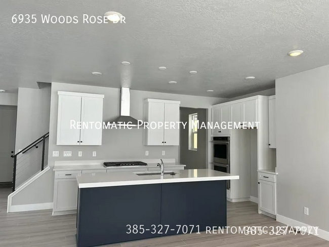 Foto del edificio - 6935 Woods Rose Dr