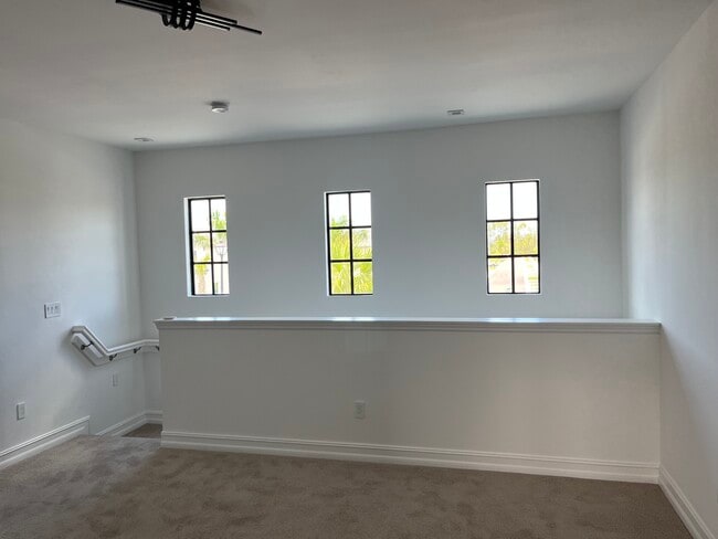 Loft- plantation shutters on order - 7498 Rockefeller Dr