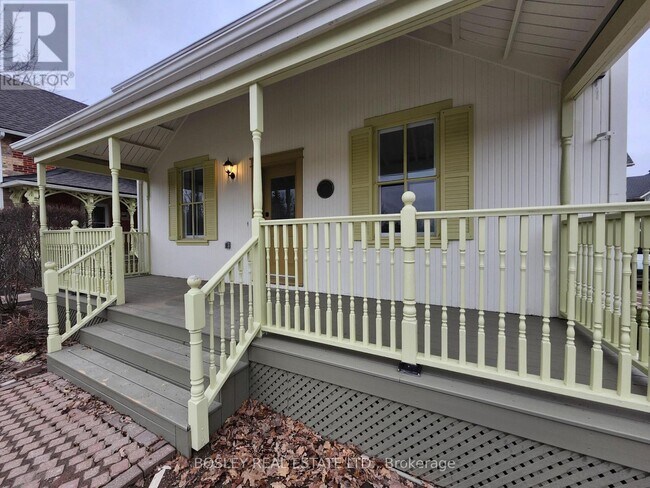 Building Photo - 5958 6th Avenue Wood