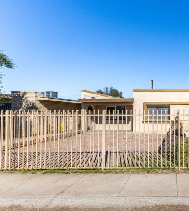 Building Photo - 6742 W Palmaire Ave