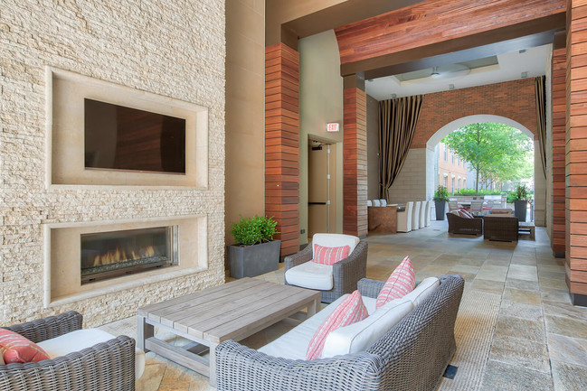 Enjoy our outdoor Loggia with plush seating and TVs - Windsor at Cambridge Park