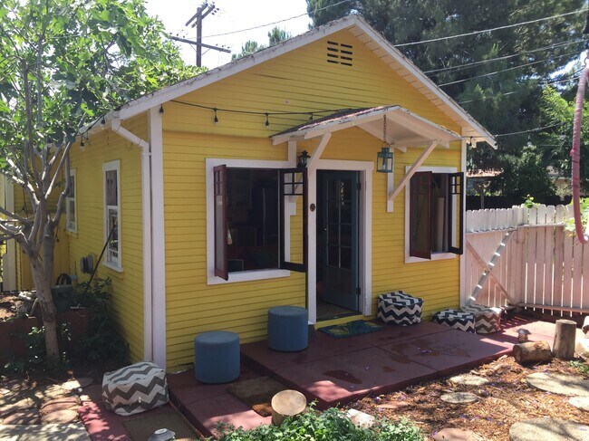 Bungalow front from yard - 3160 Atwater Ave