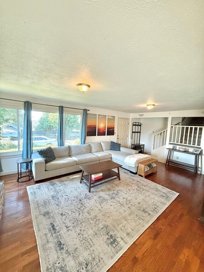Building Photo - Spacious 5-Bedroom Rainier View Home – Prime Location