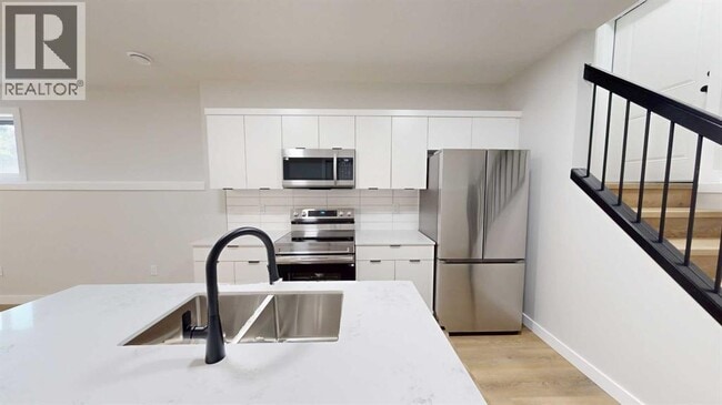 Building Photo - 10201-10126 126 Ave