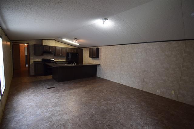 Foto del edificio - 6000 Spring Creek Pkwy