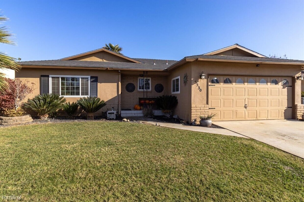 Foto principal - 3 br, 2 bath House - 5330 N Santa Fe Ave