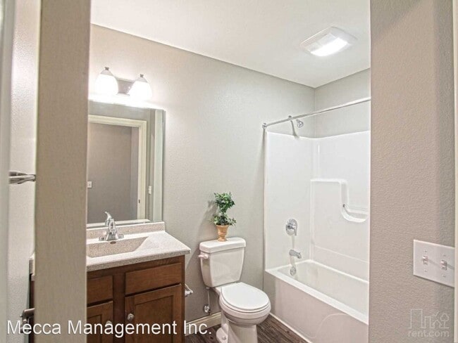 Building Photo - 7128-7128 Triumph Ln