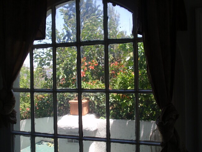 Window opening to the garden - 1343 S Burnside Ave