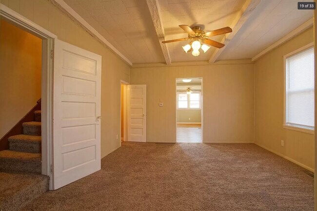 Dining room & staircase to upstairs - 702 W Winona Ave