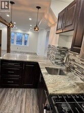 Building Photo - 1152 King St E