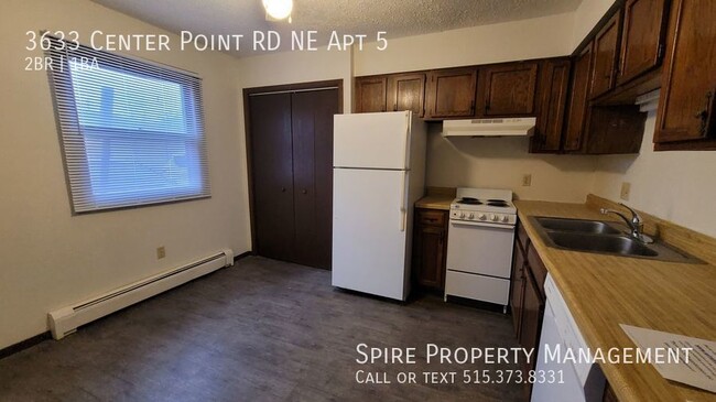 Building Photo - NE 2 bedroom 1 bath, heat & water paid!