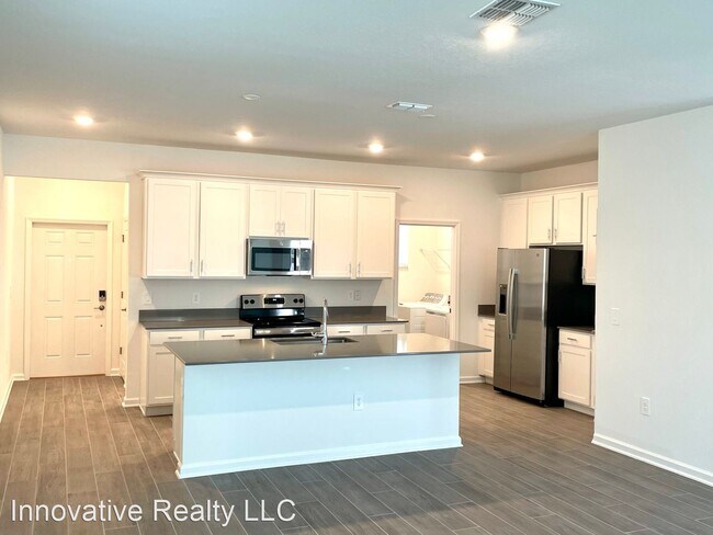 Building Photo - 3 br, 2.5 bath House - 2505 Relaxing Lane