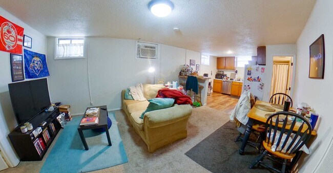Building Photo - Updated Kitchen + Fenced-in Yard + Pet Fri...