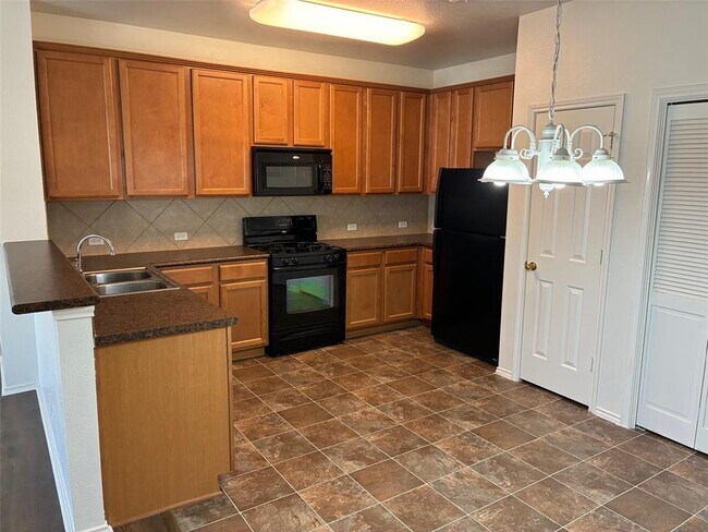 Foto del edificio - 9201 Brodie Ln